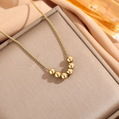 Gold Bead Pendant Necklace