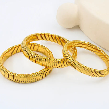 Chunky Gold Spiral Bangle