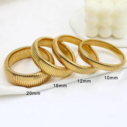 Chunky Gold Spiral Bangle