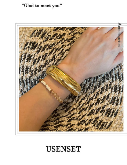 Chunky Gold Spiral Bangle