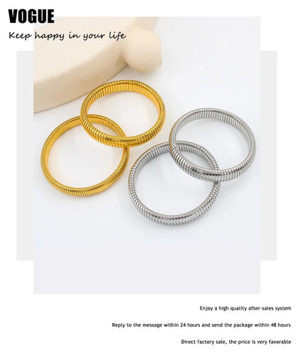 Chunky Gold Spiral Bangle