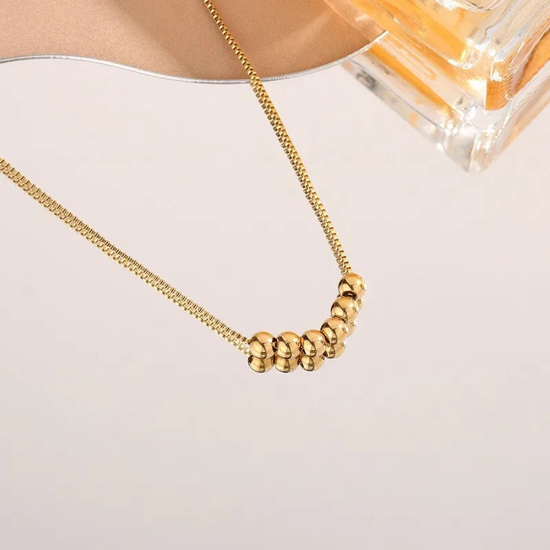Gold Bead Pendant Necklace