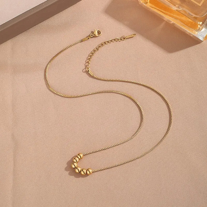 Gold Bead Pendant Necklace