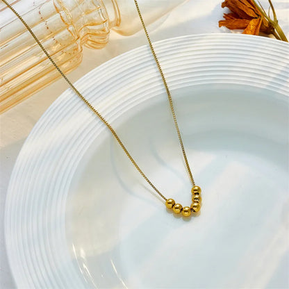 Gold Bead Pendant Necklace