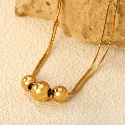 Gold Bead Pendant Necklace