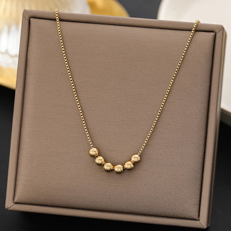 Gold Bead Pendant Necklace