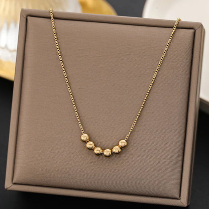 Gold Bead Pendant Necklace