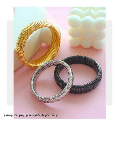 Chunky Gold Spiral Bangle