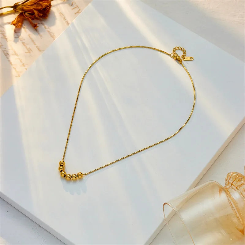 Gold Bead Pendant Necklace