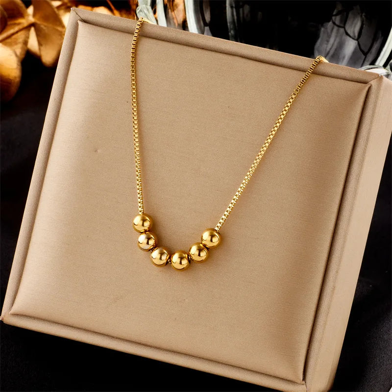 Gold Bead Pendant Necklace